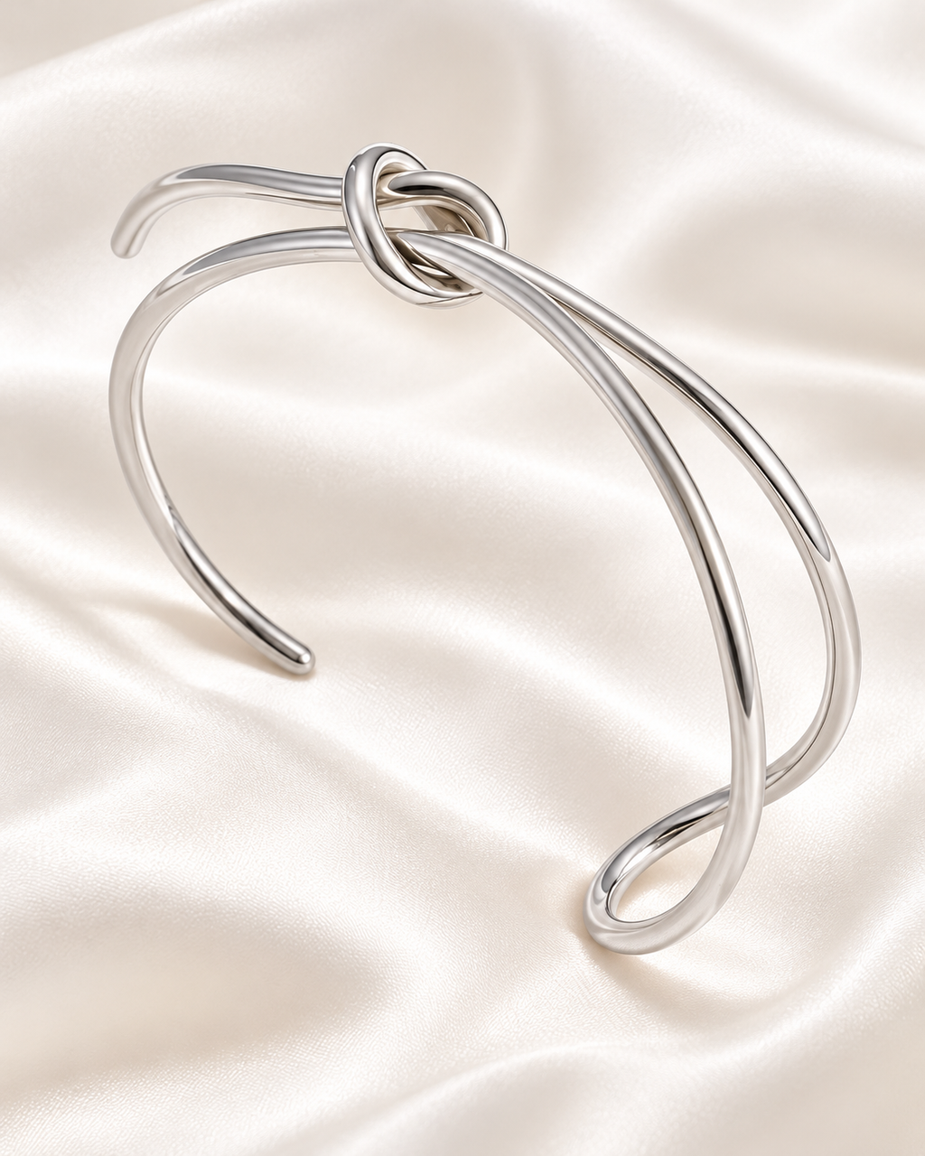 Bracelet jonc à double courbe et nœud délicat