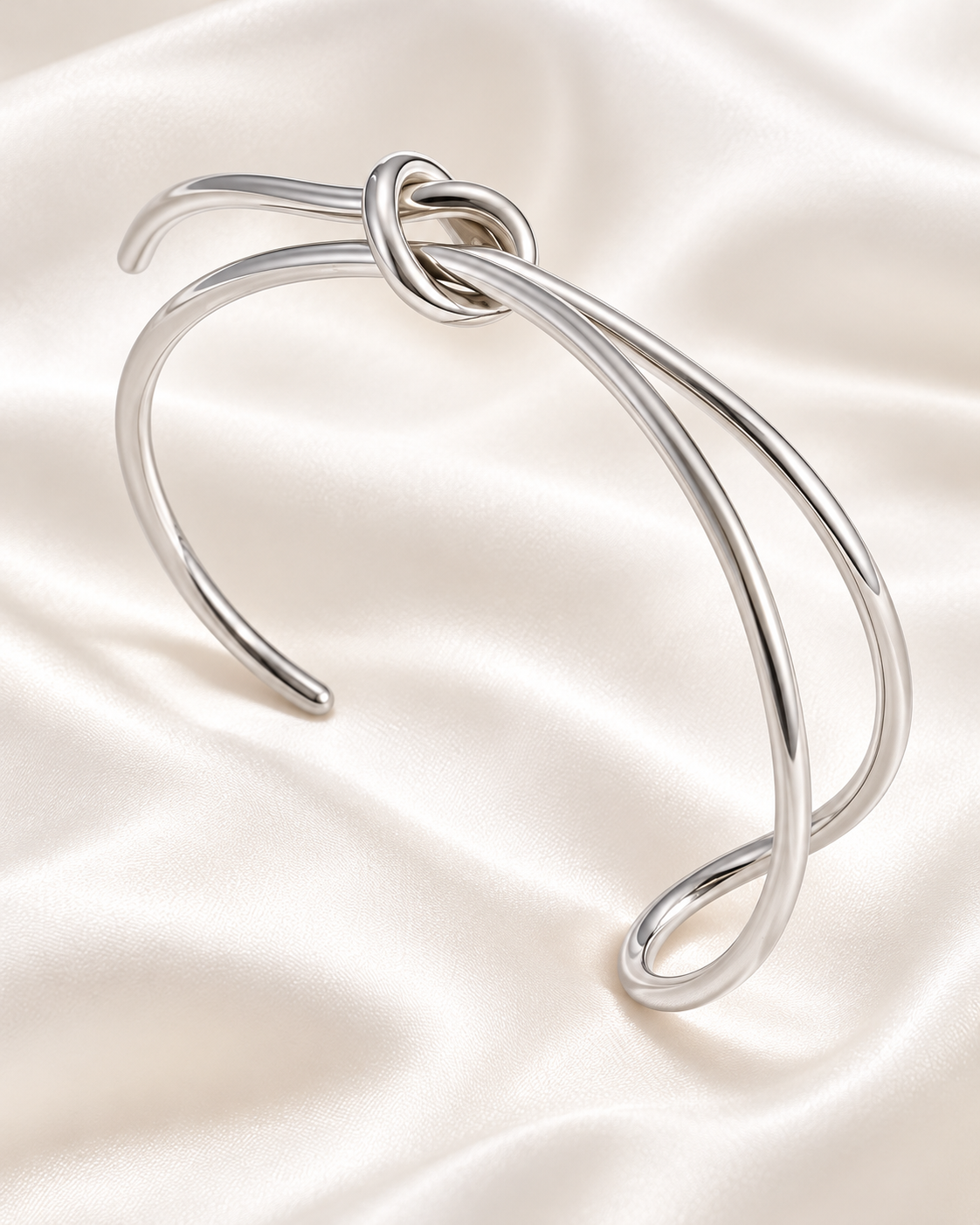 Bracelet jonc à double courbe et nœud délicat