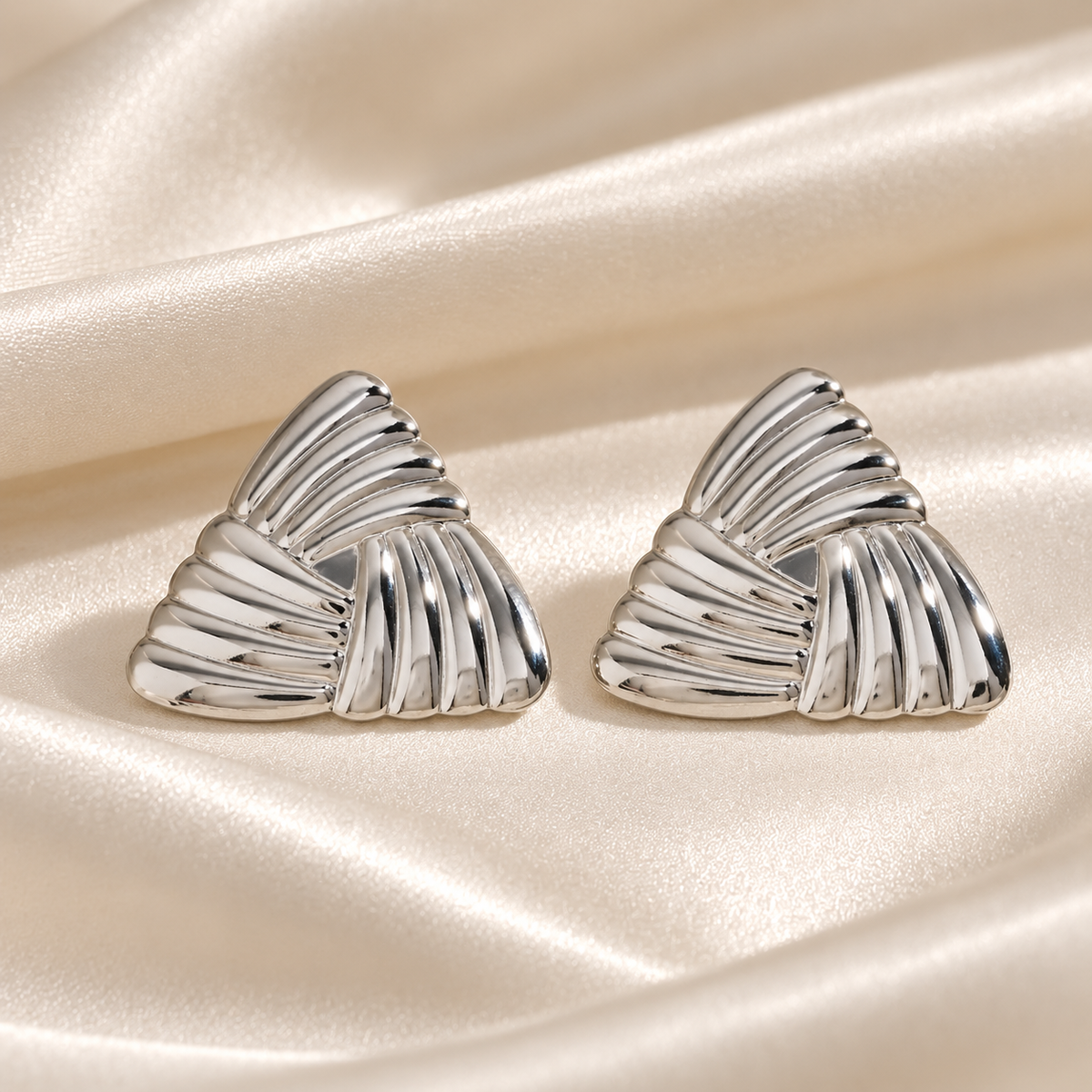 Triad / Stainless steel earrings.