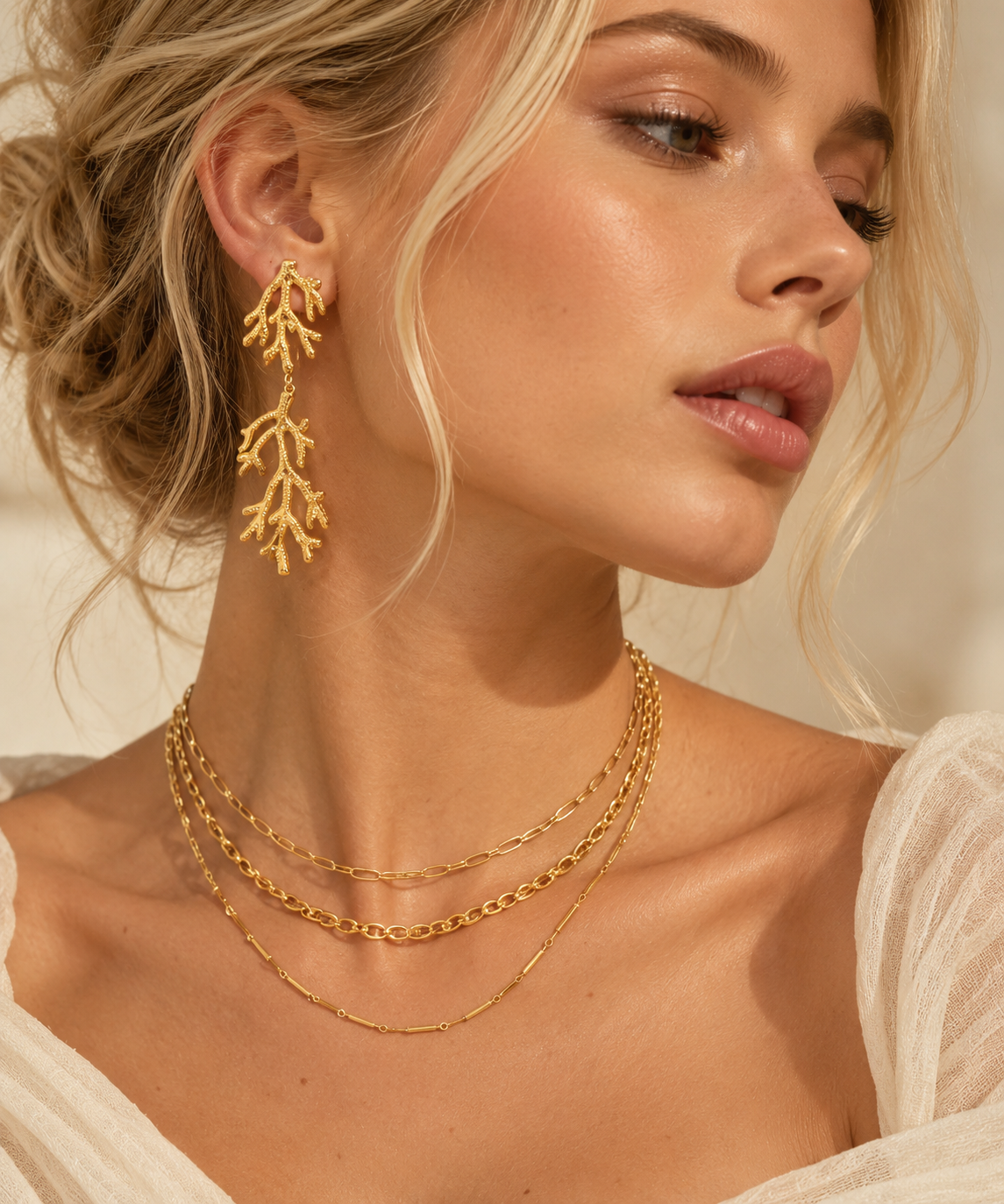 Corail / Boucles d’oreilles en acier inoxydable