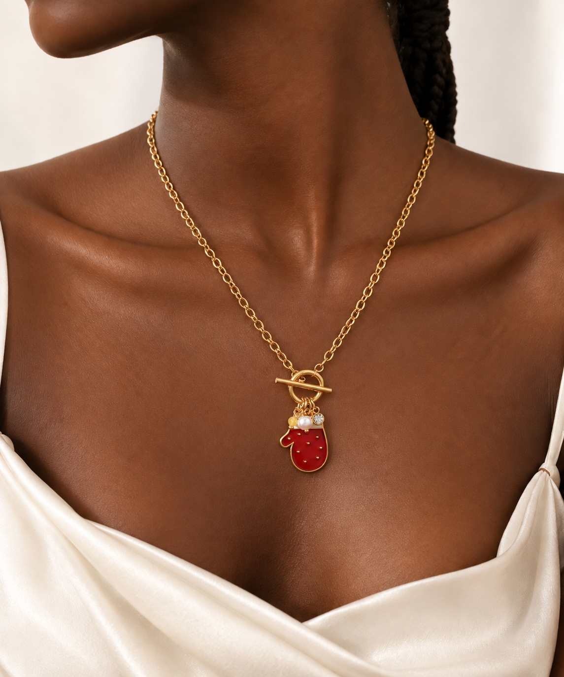 Collier Joyeux Noël – Gant rouge.