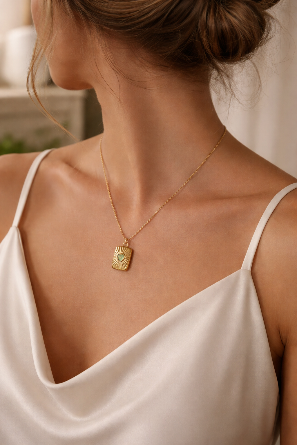 Collier médaillon cœur ouvrant doré