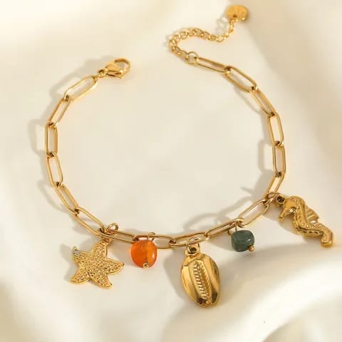 Bracelet Océan Doré – Étoile, Coquillage & Hippocampe